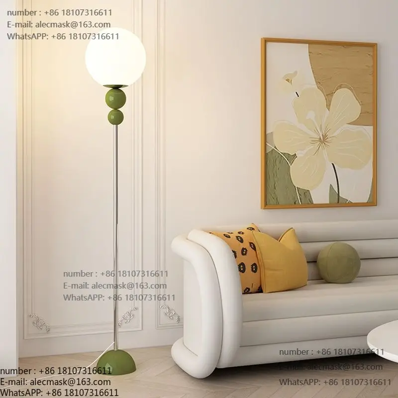 

Cream wind floor lamp, Nordic minimalist creative moon lamp next to the sofa in the living room, bedside vertical ambient lamp i