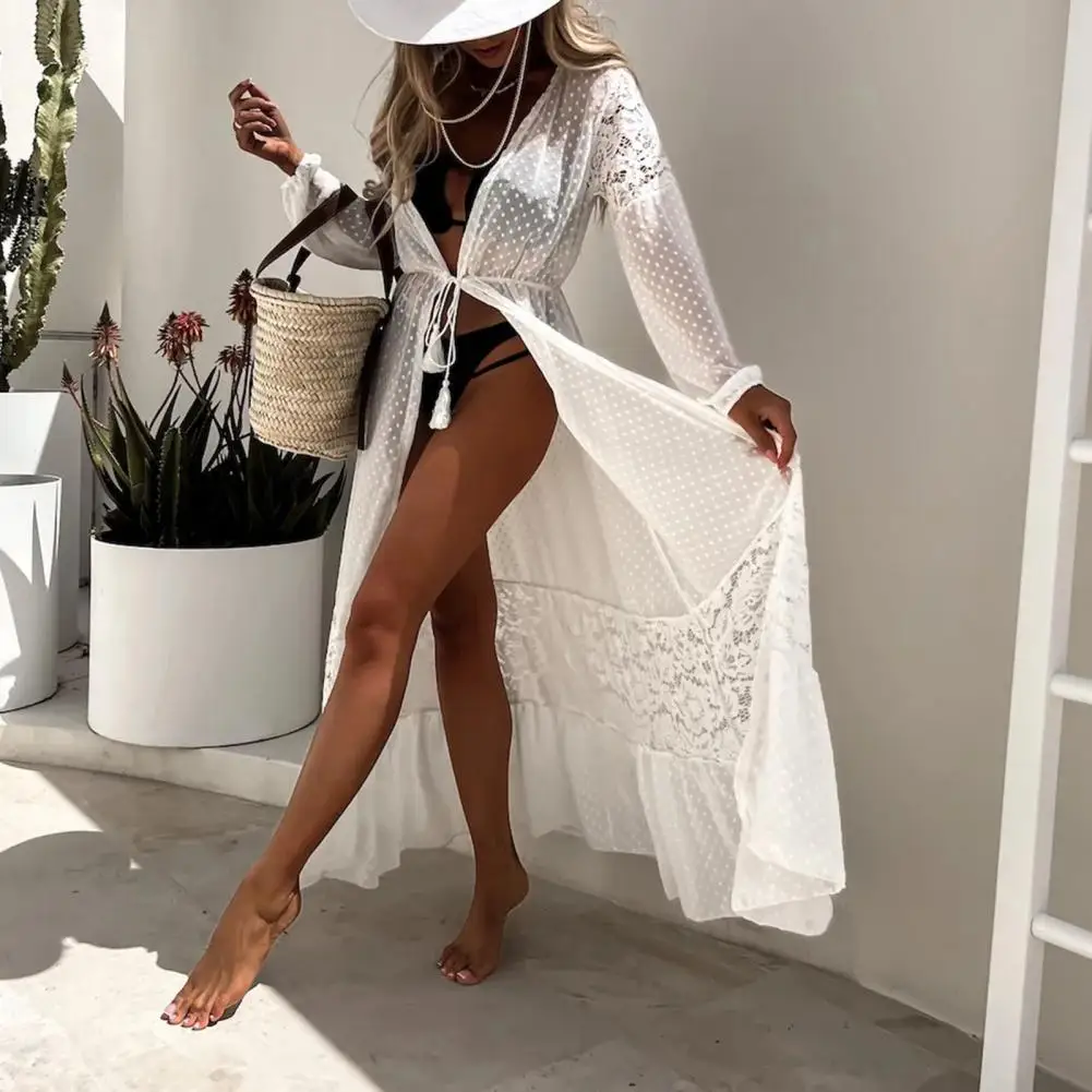 Robe de plage en dentelle transparente pour femmes, cardigan fin, manches longues, pompon, crème solaire, maxi, sexy