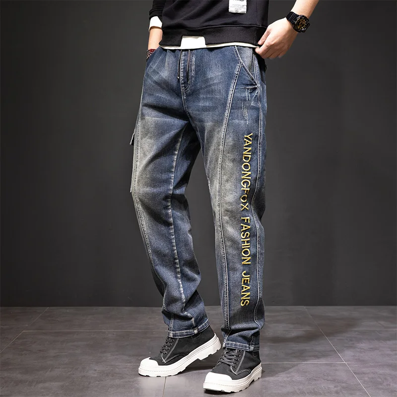 

Мужские джинсы Harajuku: эластичный пояс, свободный крой, большие размеры, модные брюки, осенний сезон, универсальный дизайн с элементами стиля.