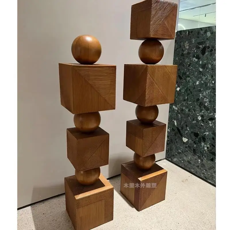 Endless black pillars wood carvings cascading floor ornaments sales office office decoration creative geometric sculpture