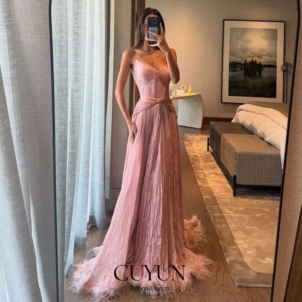 

CUYUN Customized Pink Luxury Evening Gown Strapless Pleated Feather Elegant Formal Wedding Party Guest Gown Bridesmaid Dresses