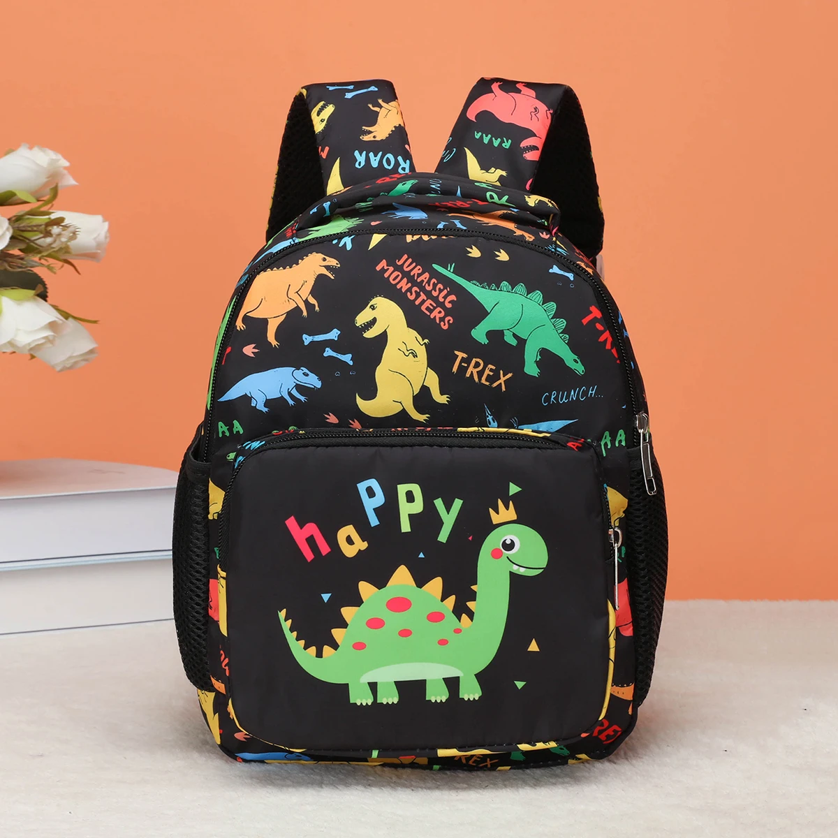 

Cute cartoon dinosaur print backpacks with all-over dinosaur patterns and letter dinosaur prints, suitable for boys and girls