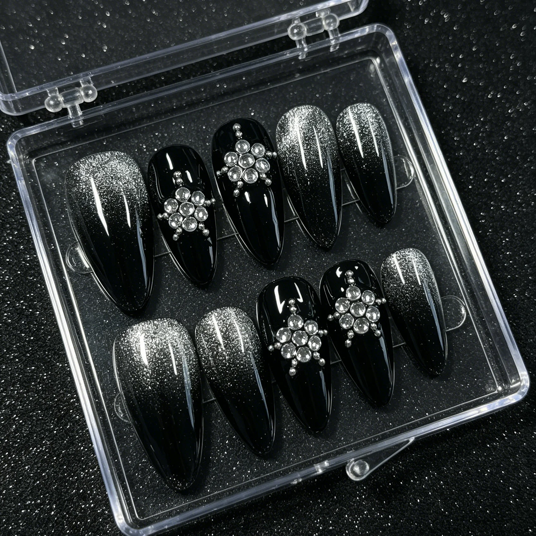 10 hand pressed almond shaped nails, beautiful fake nails, black silver gradient snowflakes, suitable for women to use view 3