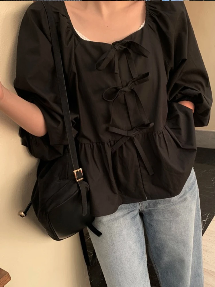 トレンドの半袖ロングシャツ レディース 春の新作 デザインセンス ボウタイ ルーズ バブルスリーブ ラウンドネック 無地シャツ