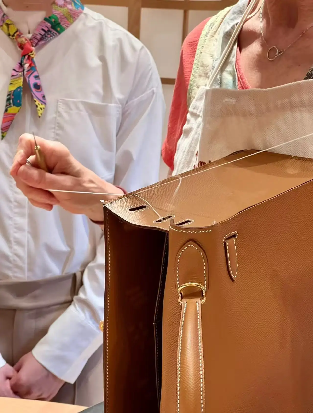 

Top-quality handmade genuine leather handbag with stitching