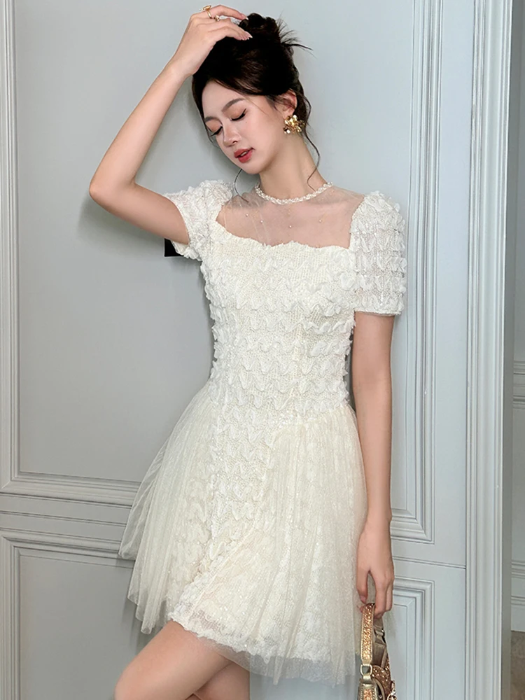 ภาษาฝรั่งเศสคําพรหมชุดมินิสําหรับผู้หญิงประณีตElegant Sheerตาข่ายเพิร์ลจีบชุดSequinsวันเกิดชุดราตรีVestidosหญิง