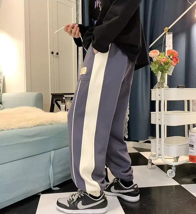 

Spring and fall sports pants men patchwork color patchwork loose bunched feet casual pants large size trend pants 2024