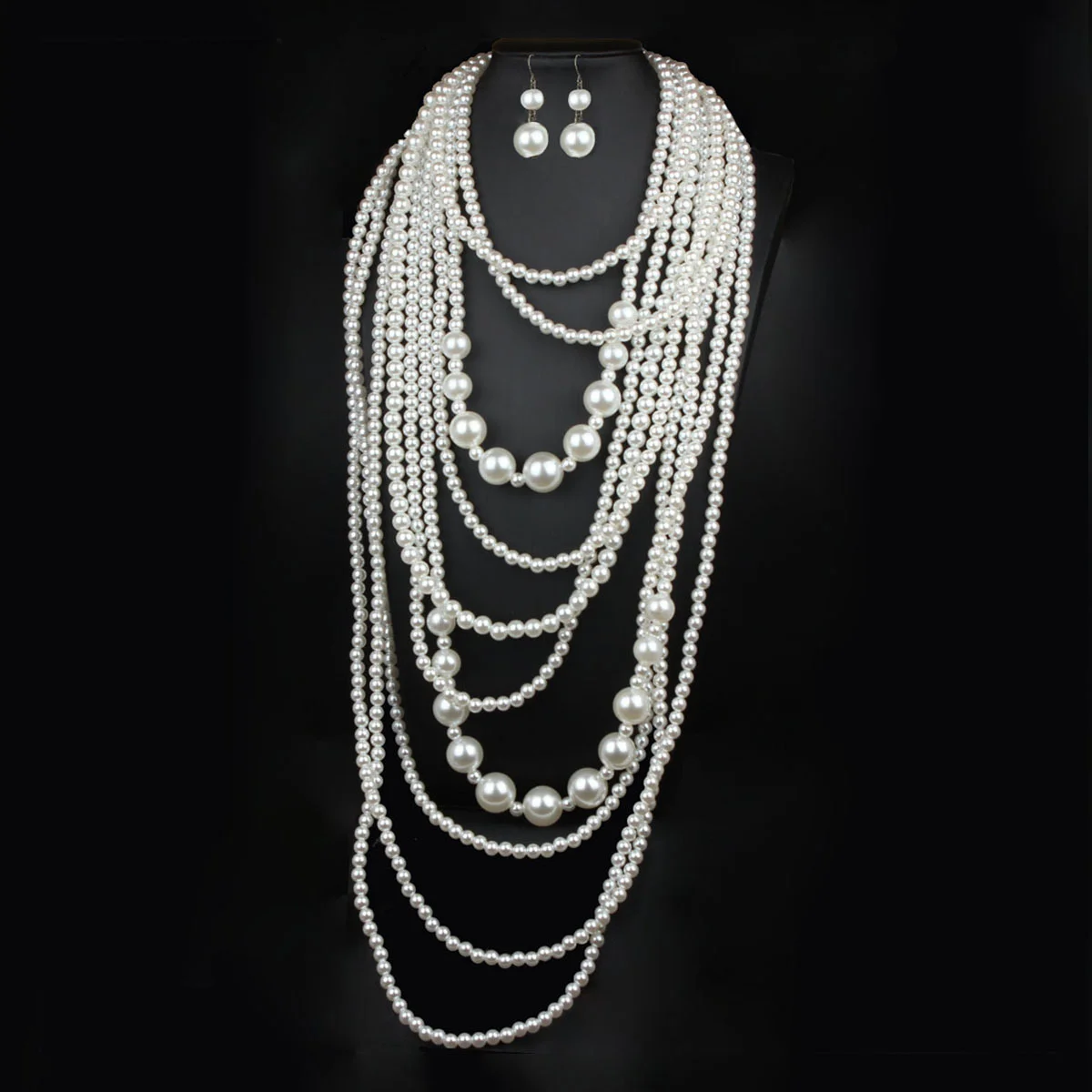 

European and American style long and multi-layered pearl necklace and earrings set, highly versatile and fashionable.
