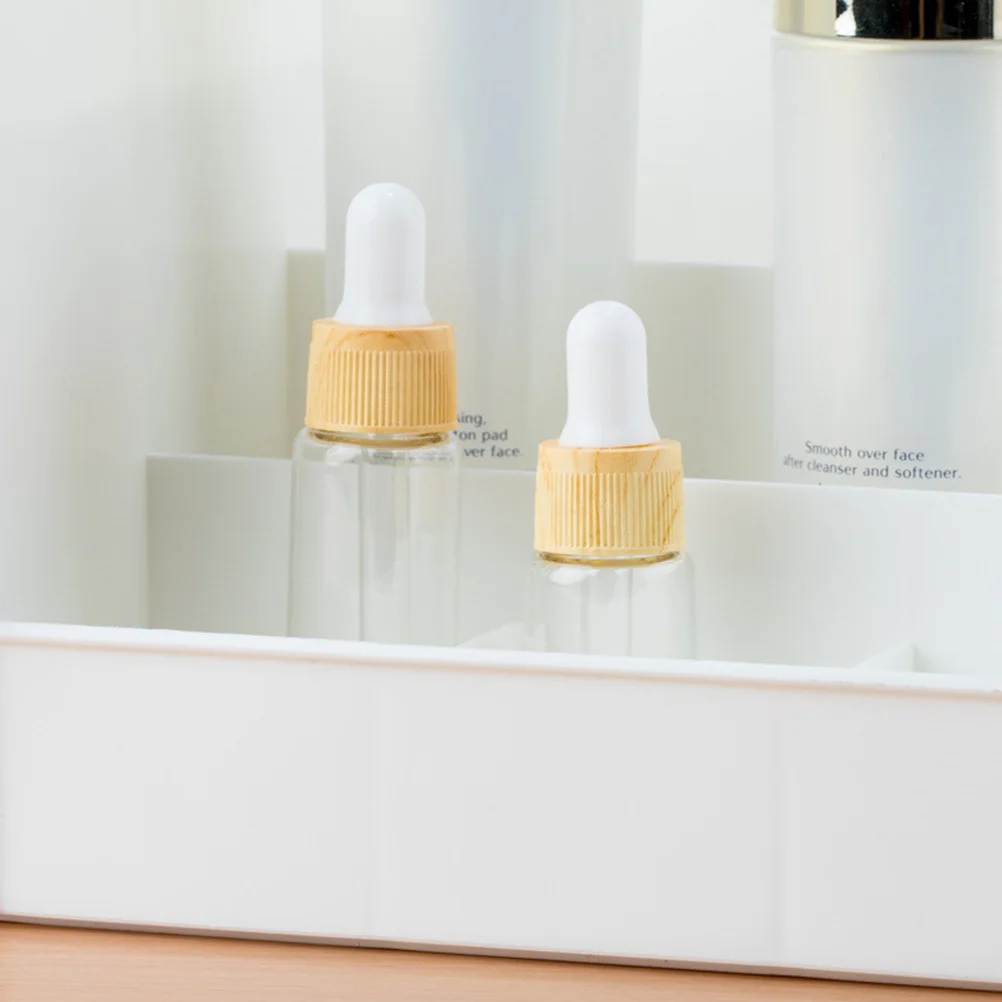 

4Pcs Wood Grain Glass Dropper Bottles Transparent Essential Oil Container Durable Dispenser 10ml Glass Dropper Bottle