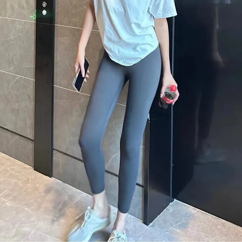 

Naked Yoga Pants Sports Sexy High Waist Hip Lift Nine Points Breathable Tight Quick Drying Spring Girl Thin Legs