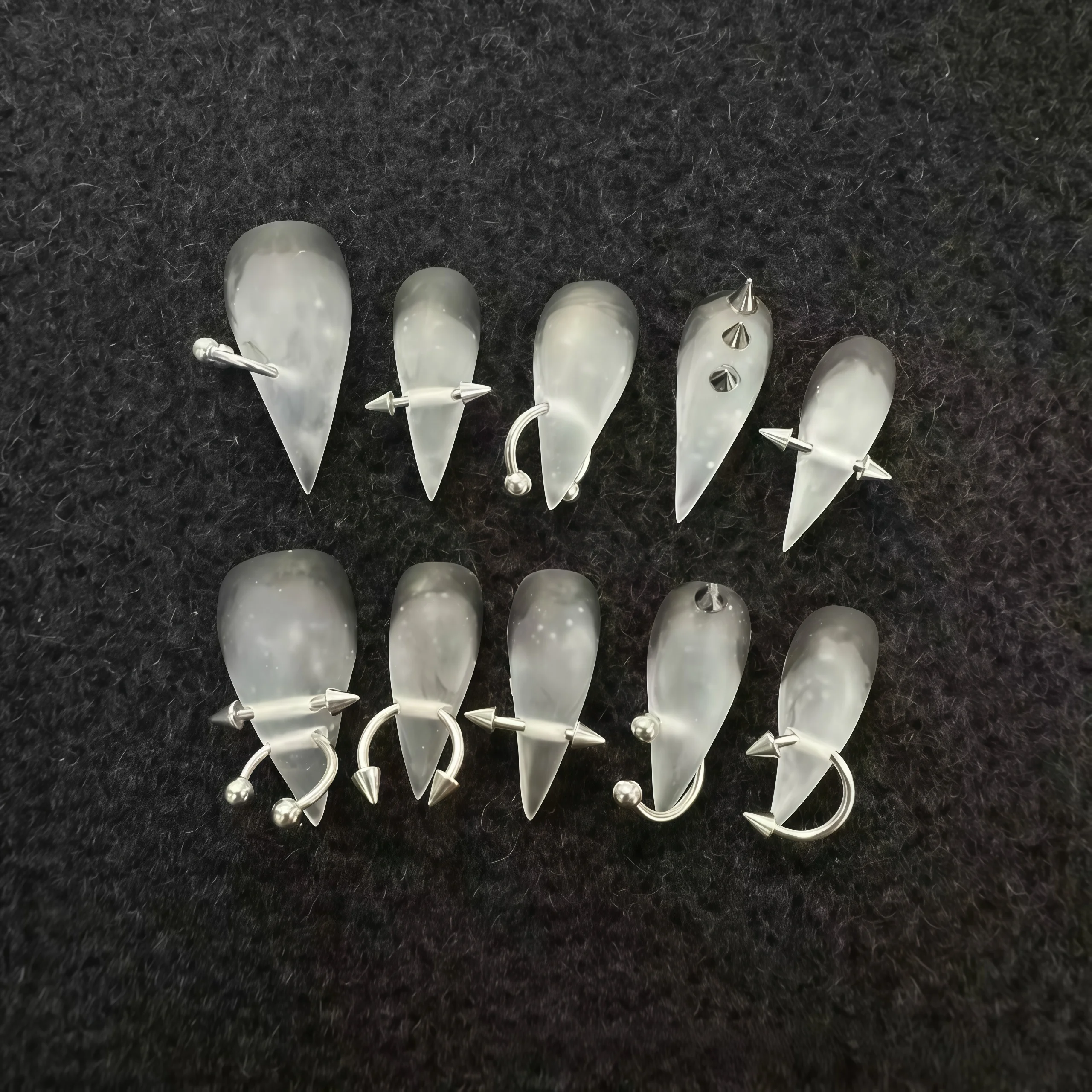 10PCS Translucent black smoky gradient curved claw-shaped nail stickers with Gothic style silver spiky perforated decorations