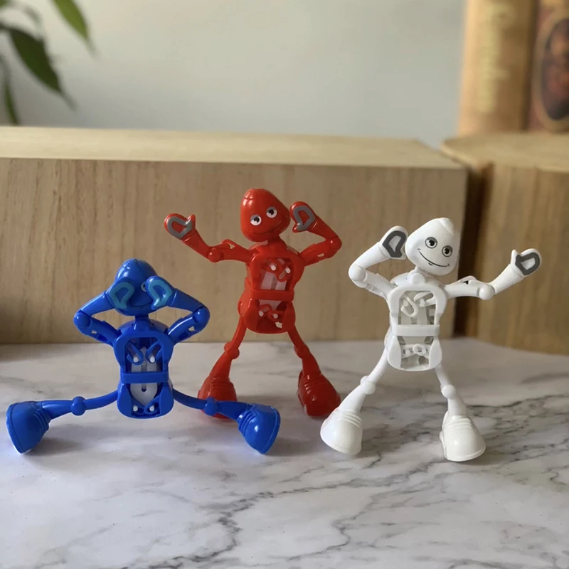 Dancing Robot Novelty Funny Upper Chain Dancing Robot Toy Cover The Face Twisted Ass Dancing Swinging Walking Clockwork Toy