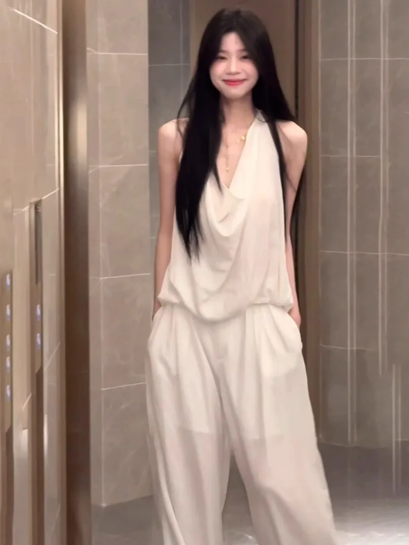 

Летний женский модный комплект больших размеров: топ с V-образным вырезом и широкие брюки. Уникальный повседневный костюм-двойка премиум-класса.