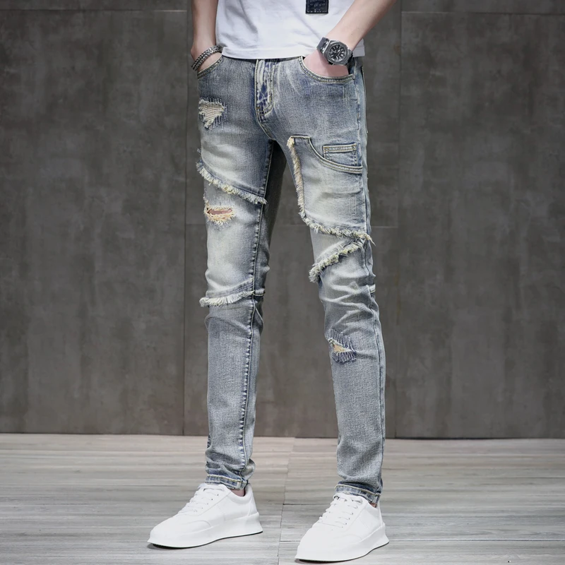 Street hip-hop retro men's jeans personalized hole embroidery raw edge Slim small straight leg splicing elastic men's pants