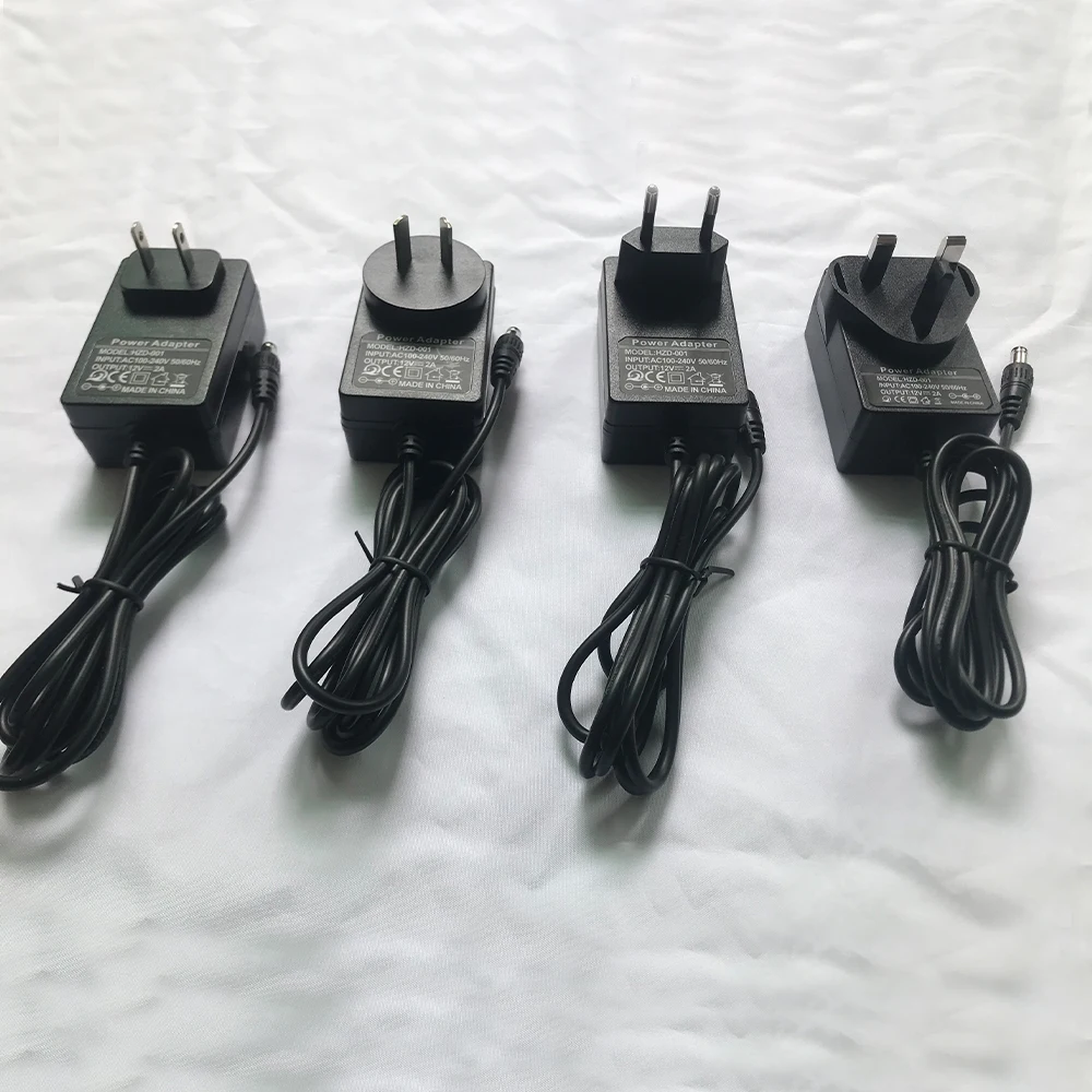 

Адаптер питания переменного тока 100-240 В, 50/60 Гц на 12 В постоянного тока, 2 А, вилка 5,5 мм х 2,1 мм, подходит для красных фонарей, терапевтических ремней, электрических инструментов