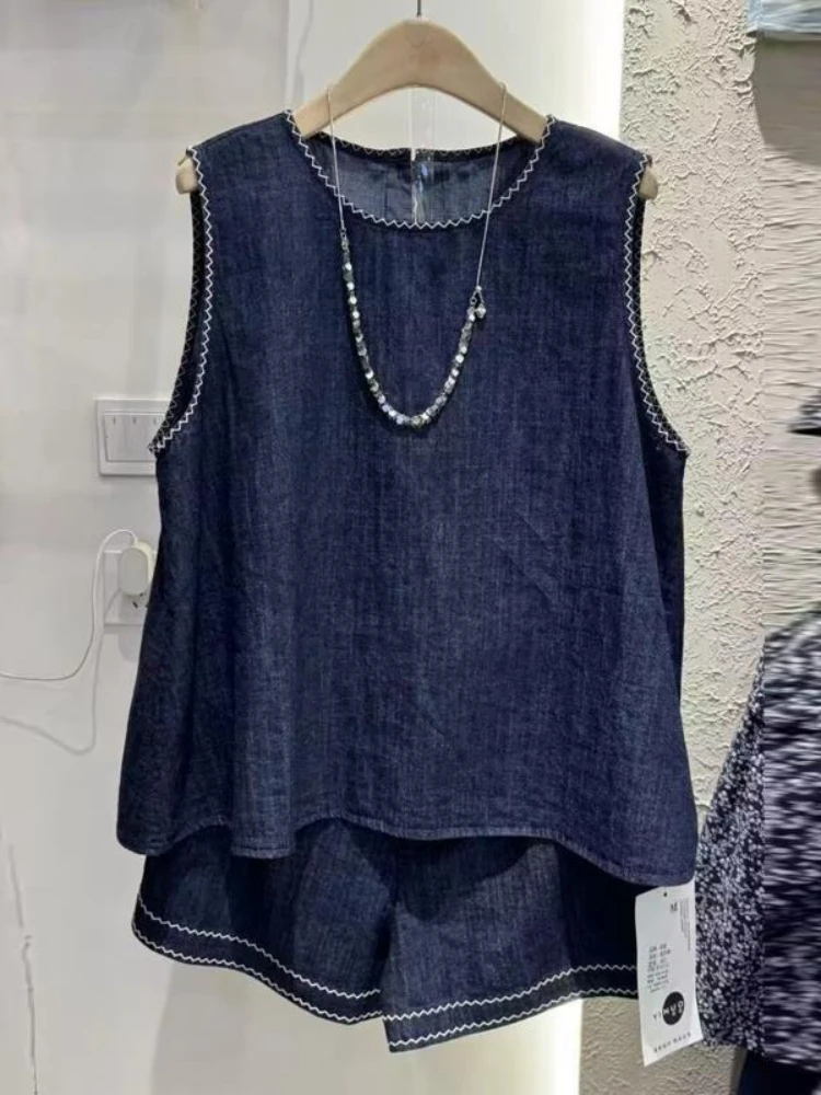 

Корейский повседневный джинсовый комплект из двух предметов для женщин: летний новый комплект с круглым вырезом, безрукавка + шорты с высокой талией, свободный модный комплект.