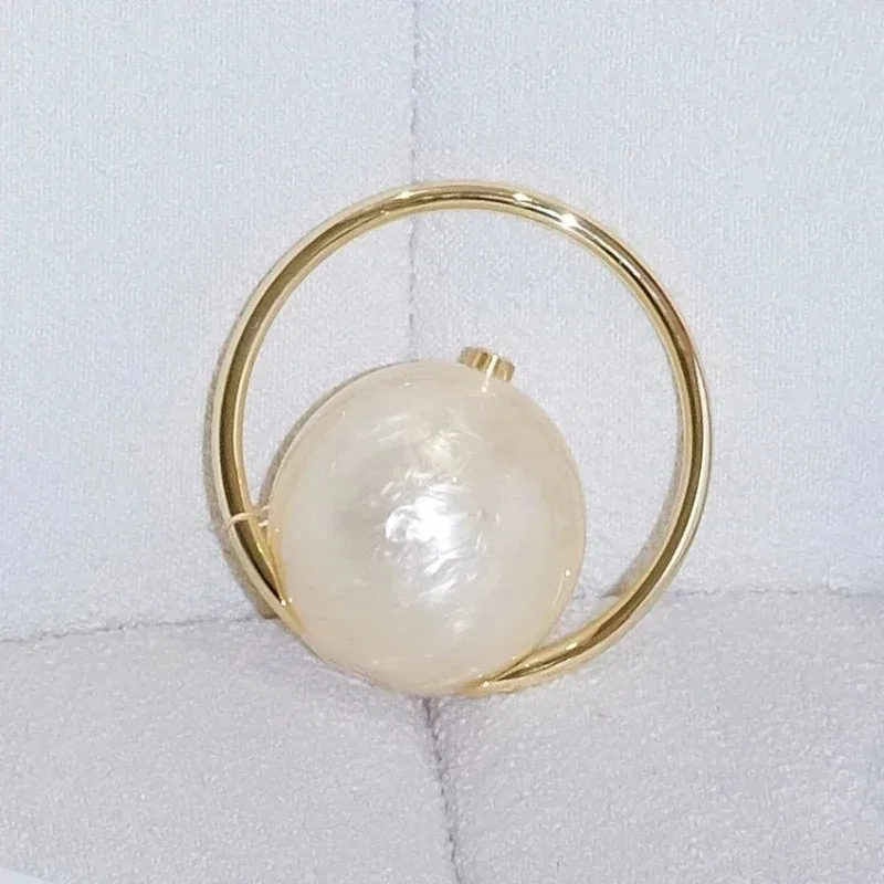 

Ring geometric spherical pearlescent acrylic clutch bag