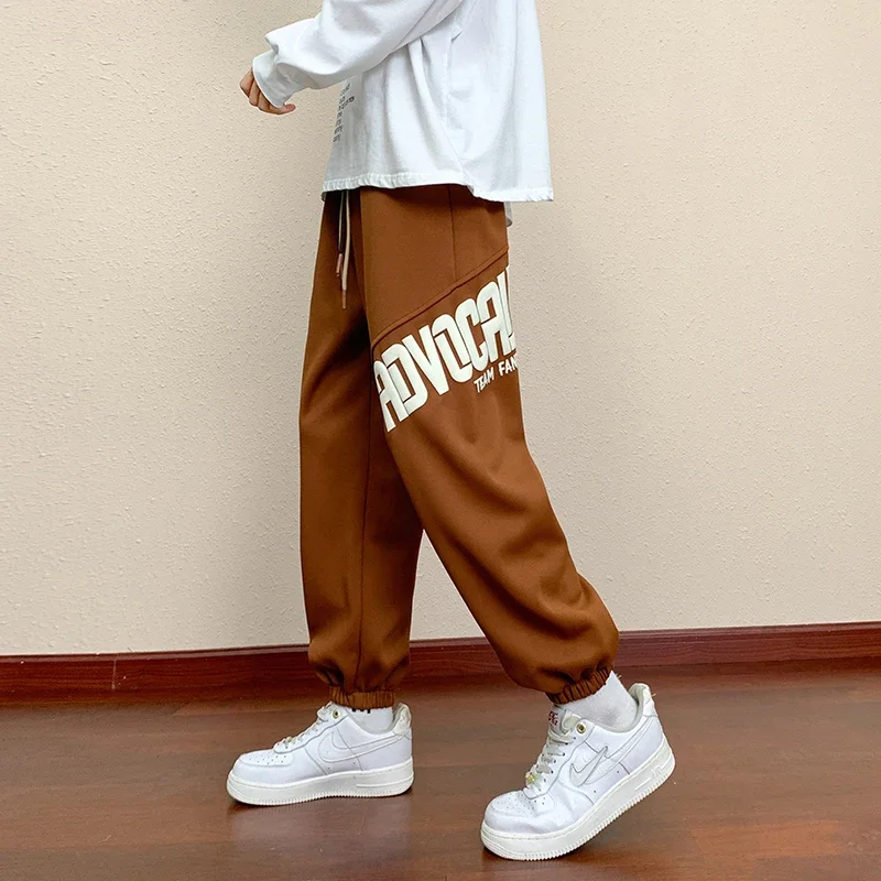 กางเกงขายาวทรงตรง น้ำหนักเบา ระบายอากาศดี สไตล์ลำลอง แฟชั่นใหม่ สำหรับผู้ชายและผู้หญิง เหมาะกับฤดูใบไม้ร่วง เอวยางยืด มีเชือกผูก