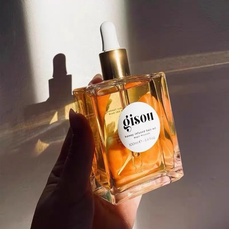 L'olio per la cura dei capelli con infusione di miele Gisou alla moda migliora la cura dei capelli secchi e irrequieti Balsamo per capelli con ritenzione di fragranza morbida e duratura
