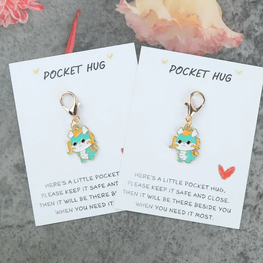 1pc/2pcs Cartoon Dragon Keychain with a Motivational Card. Perfect as a Gift for Friends and Family.