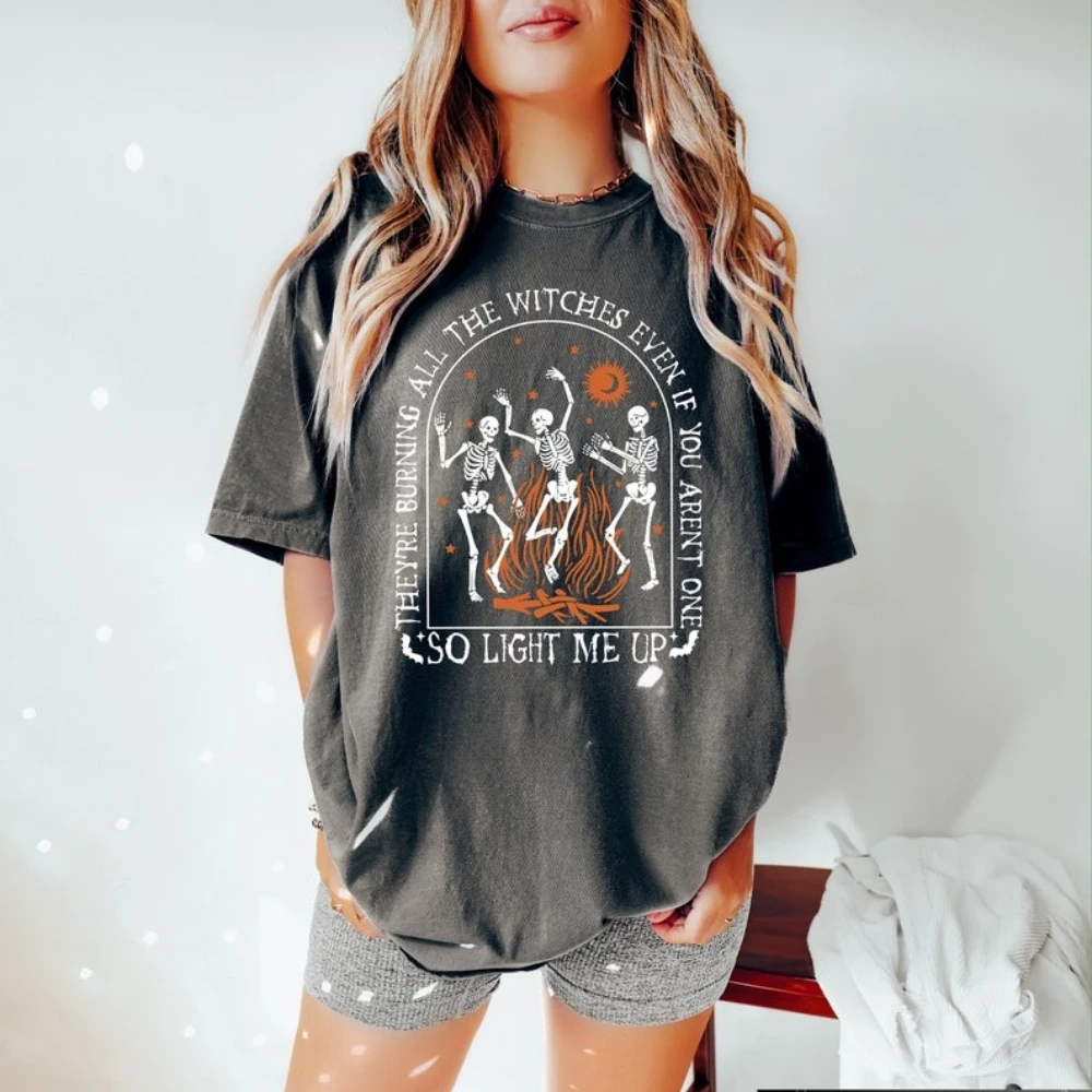 

Retro Dancing Skeleton Woman Graphic T Shirts They're Burning All The Witches Shirt Funny Skeleton Witchy Trendy Halloween Tops