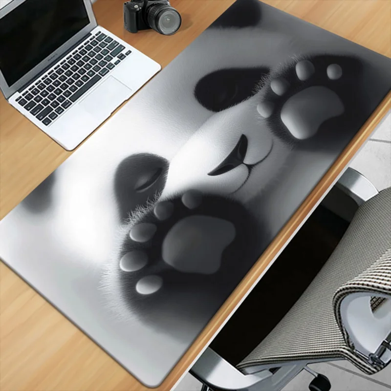 

Cute panda paw mouse pad has an anti-slip surface made of rubber and is easy to clean. It is a desktop decoration for computers