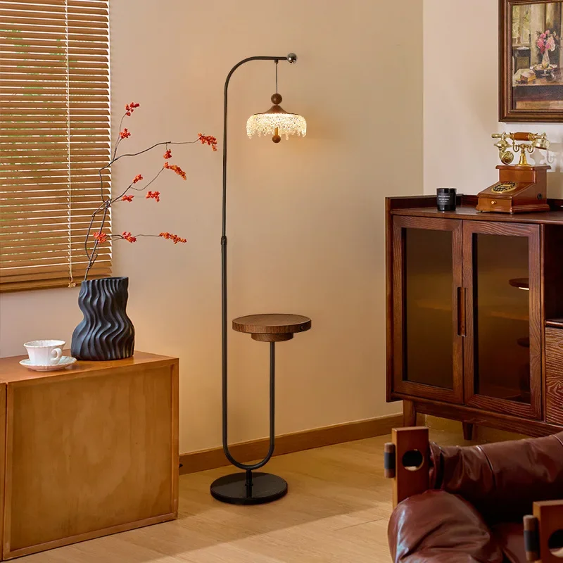 Water drop floor lamp, high-end walnut-colored shelf next to the sofa in the living room, integrated side several bedroom ambien