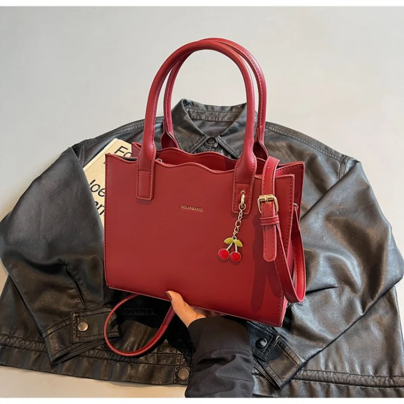 

Classic Women Satchel In Rich Mahogany Colored Leather With Protective Brass Feet Durable