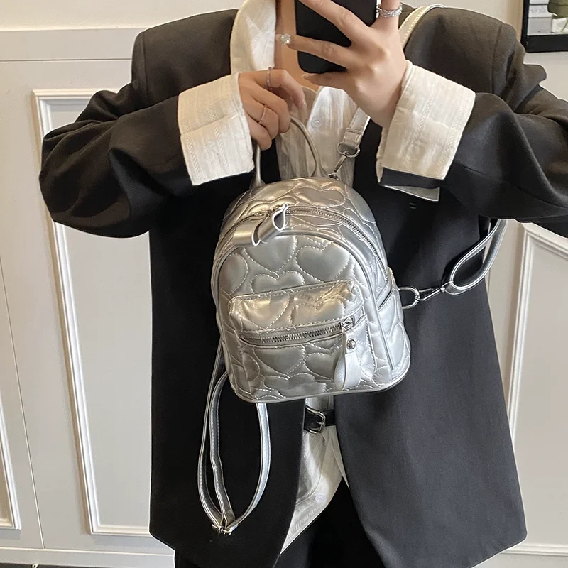 

2025 New Fashion Silver Backpack for Women Versatile Heart Pattern Student Shool Bags Trendy Travel Shopping Backpack For Girls