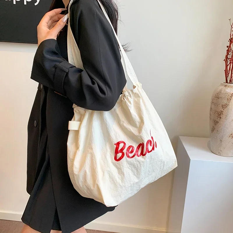 

2025 New Shoulder Bag Commuter Shoulder Cloth Bag Women's Large Capacity Summer Drawstring Tote Bag Bolsa De Tote