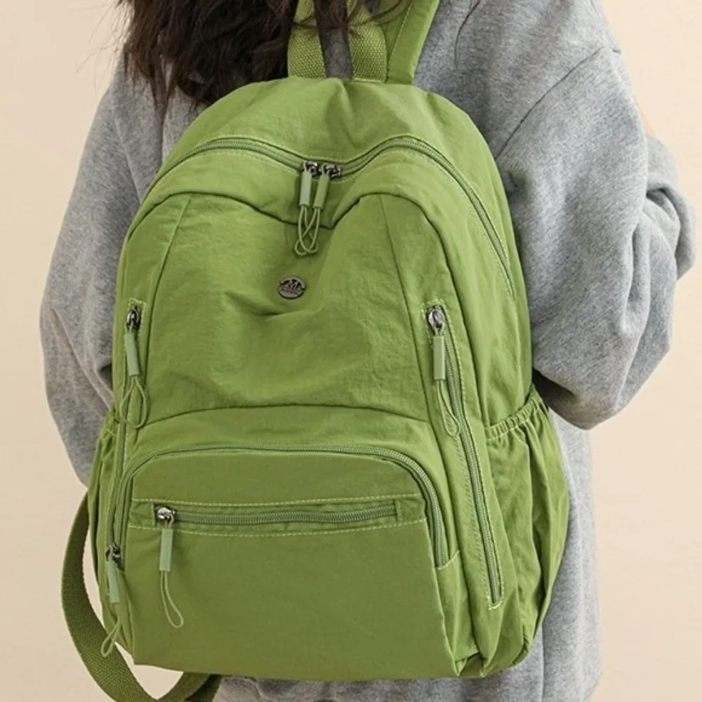Large Capacity Nylon Backpack Lightweight Secure Zipper Closure Daypack Waterproof Adjustable Straps School Backpack Daily Use