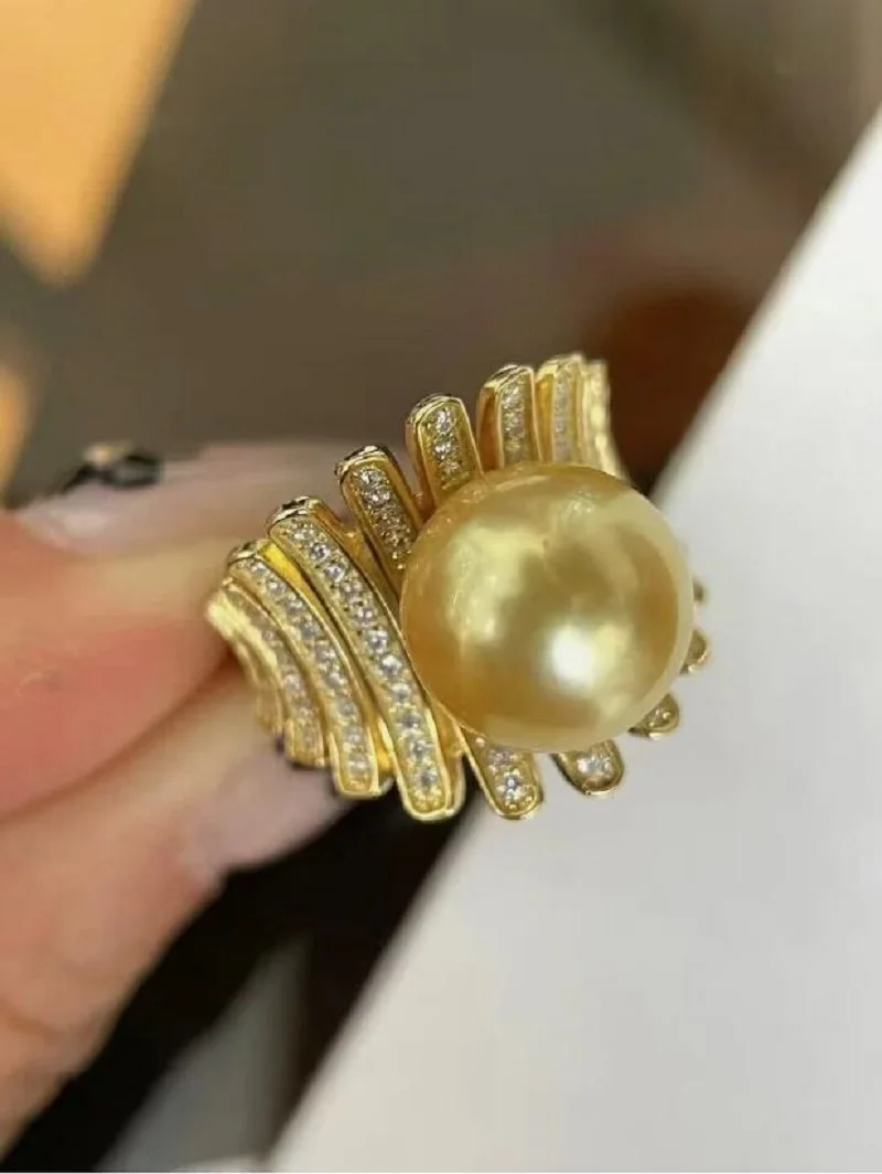 

Великолепное кольцо с круглым золотым жемчугом Южного моря диаметром 10–11 мм, 925 пробы.