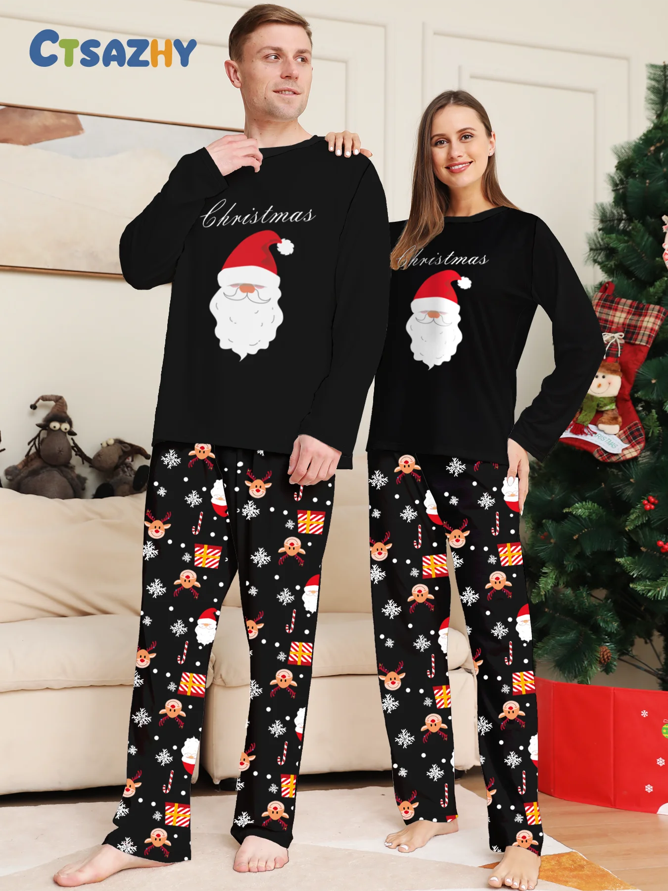 

Festive Christmas Couple Loungewear: Santa & 'Christmas' Black Tops, Patterned Pants with Reindeer/Snowflake/Gift