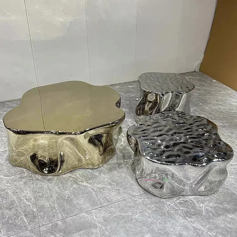 

Modern light luxury stainless steel combination coffee table living room home high-end special-shaped designer high-end sofa