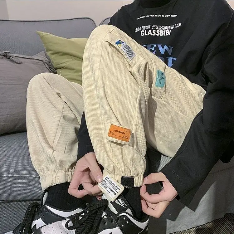 

Прочная не скатывается, не выцветающая мужская летняя новая рабочая одежда, грязеотталкивающие утягивающие брюки с волшебной нашивкой до щиколотки