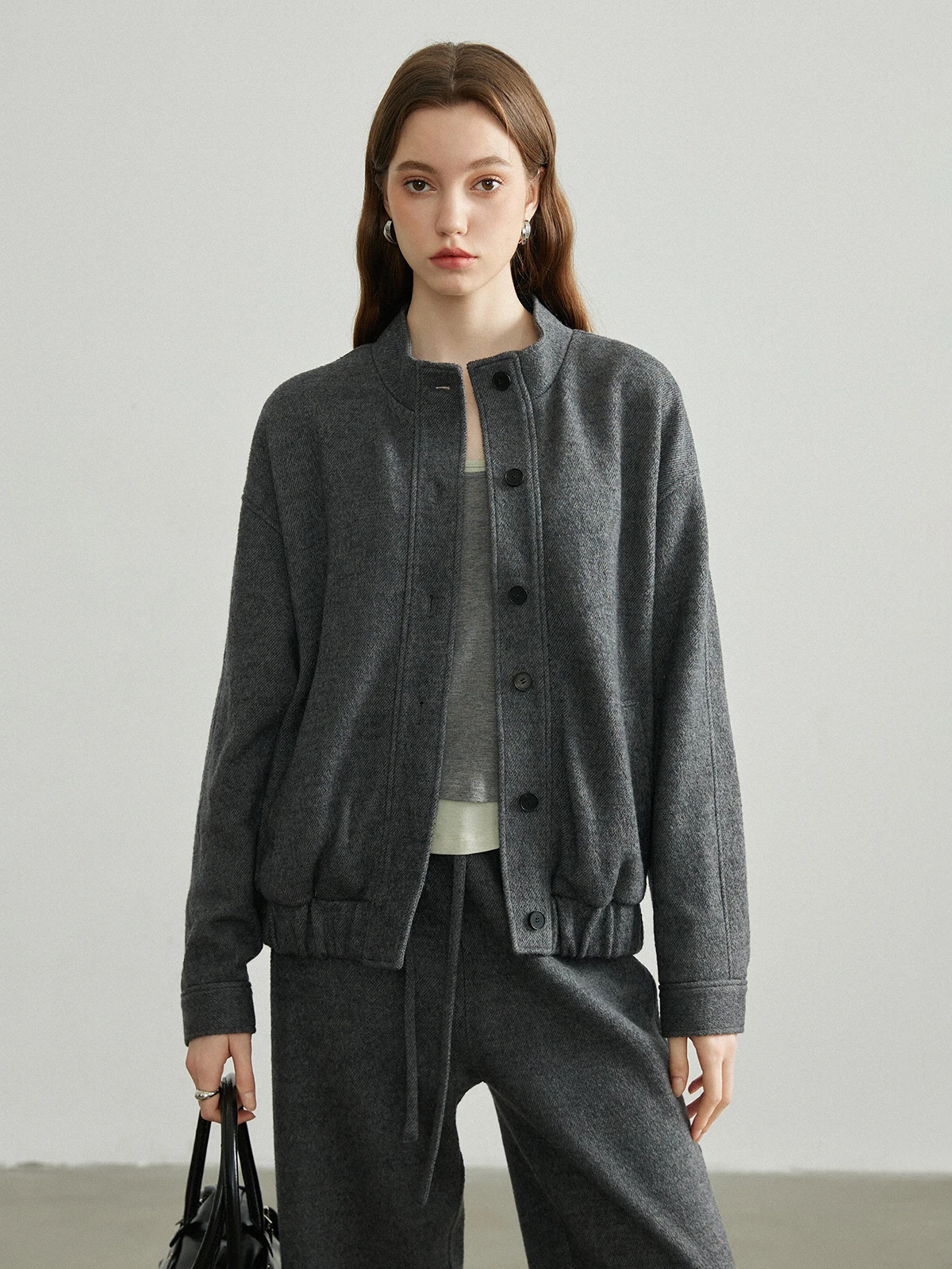 

Новая осенне-зимняя женская вязаная куртка свободного кроя с воротником-стойкой, универсальная повседневная модель с длинными рукавами и застежкой на пуговицах