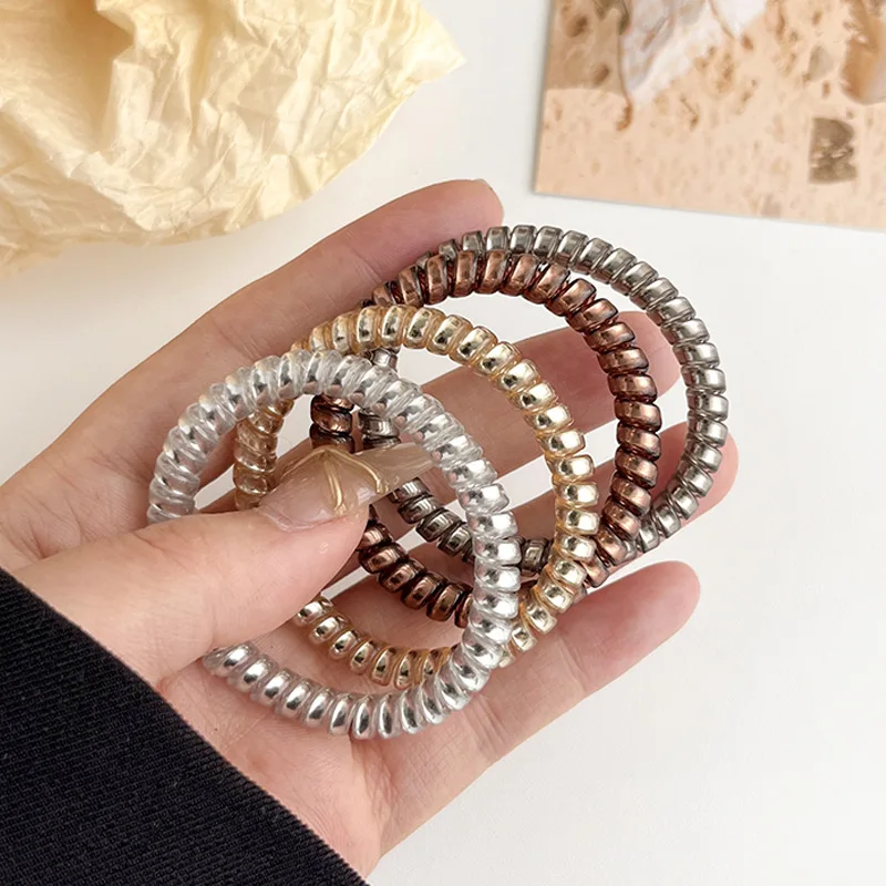 

4 Pcs/Lot Thin Telephone Wire Hair Bands Rope Gum Hair Ring Spiral Rubber Bands Shinning Gold Silver Accessories For Women Girl