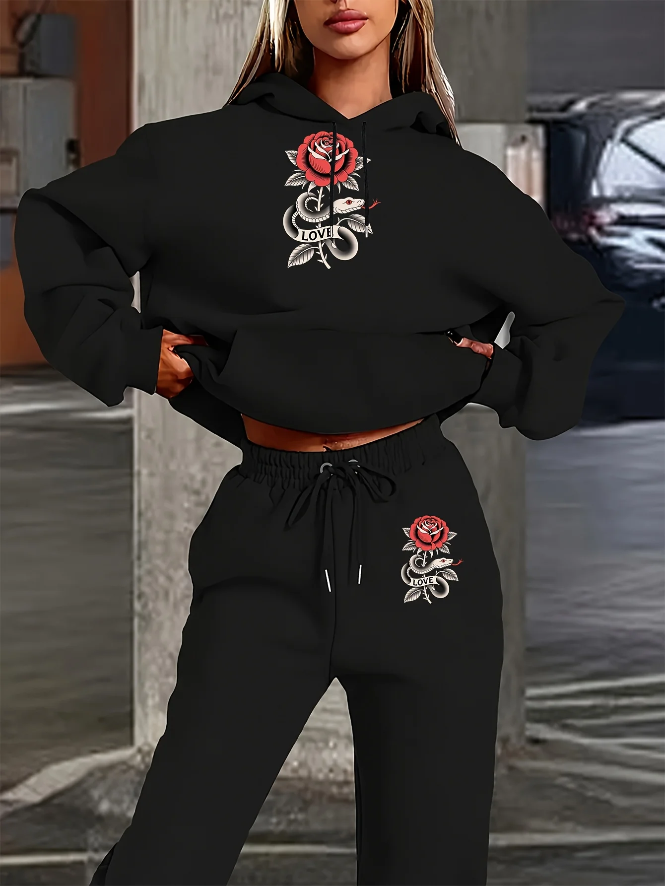 Ladies two‑piece hoodie tracksuit featured with unique traditional tattoo‑style snake‑rose‑heart print