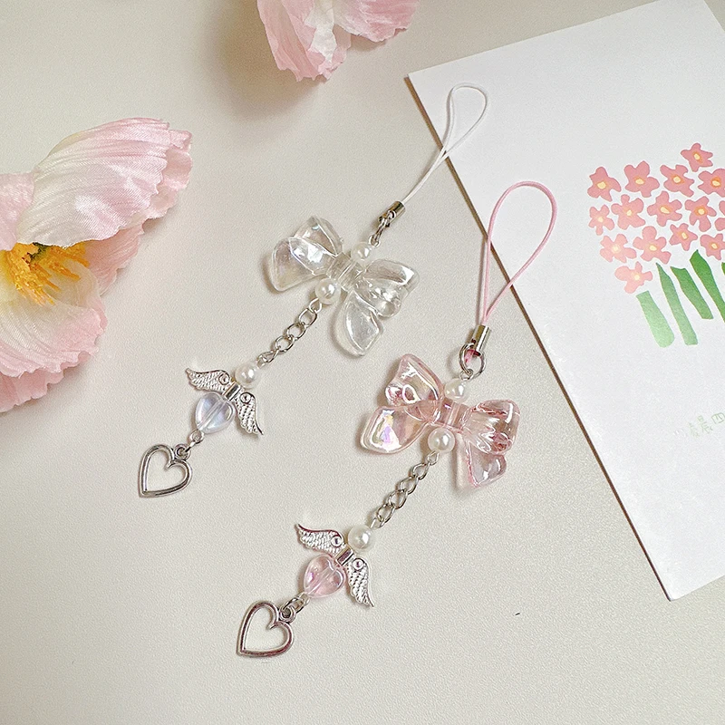 สายโซ่คล้องโทรศัพท์รูปโบว์ Y2k หวานปีกนางฟ้าน่ารักจี้รูปหัวใจเคสสายคล้องคอป้องกันการสูญหาย