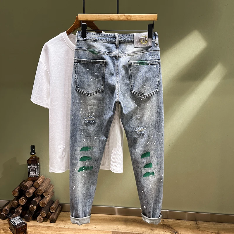 

TC2892 Trendy jeans men's broken holes tide elastic Slim embroidery patches spray-painted small leg trousers