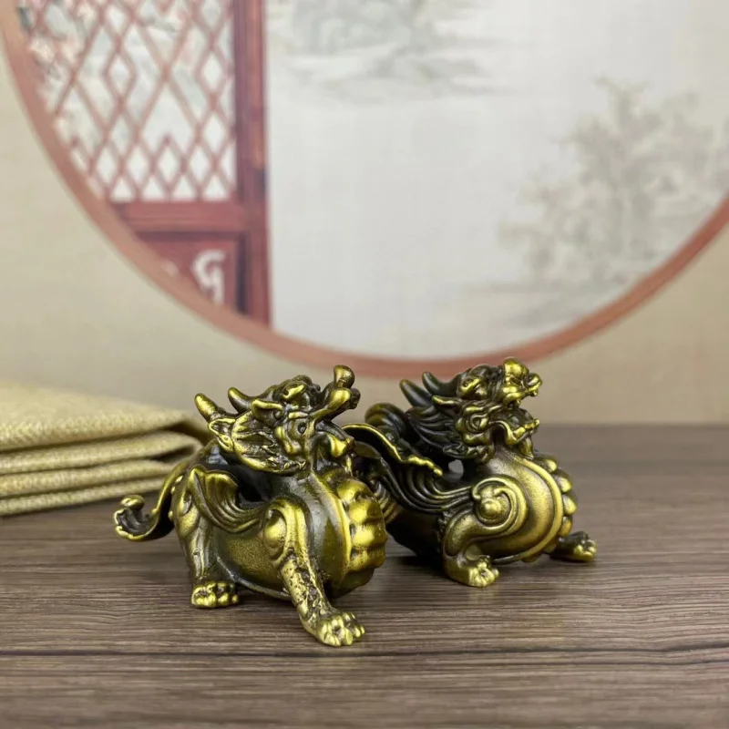 A pair of brass Pixiu ornaments, male and female, made entirely of copper, suitable for home, office, study, wine cabinet, or as