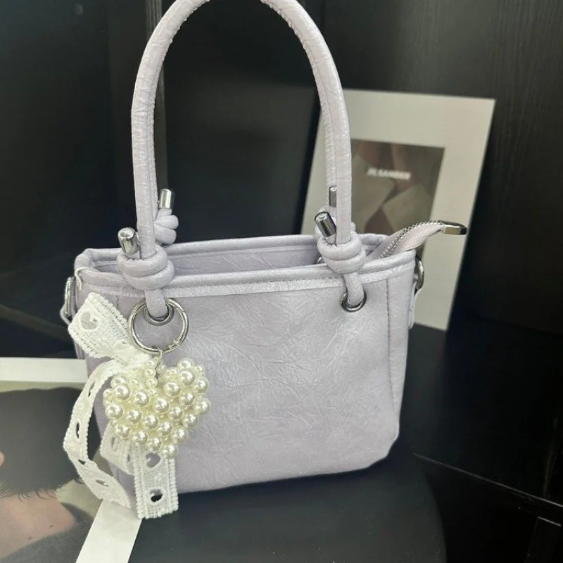 

Breathable Perforated Summer Tote For Women Designer Inspired Leather Bag With Modern Cut Out Details