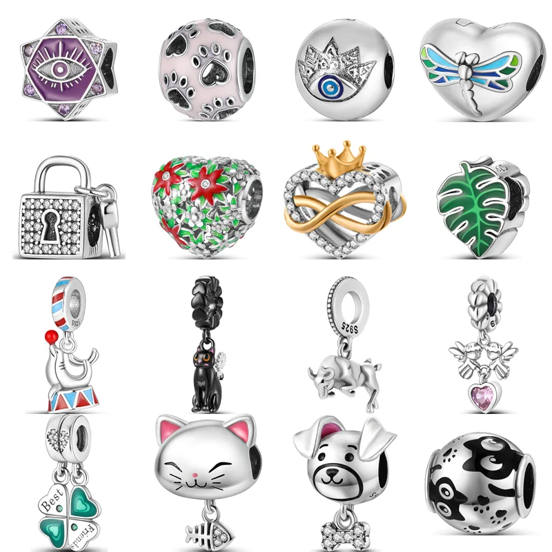 

Женский серебряный браслет с изображением кошек и собачьих лап