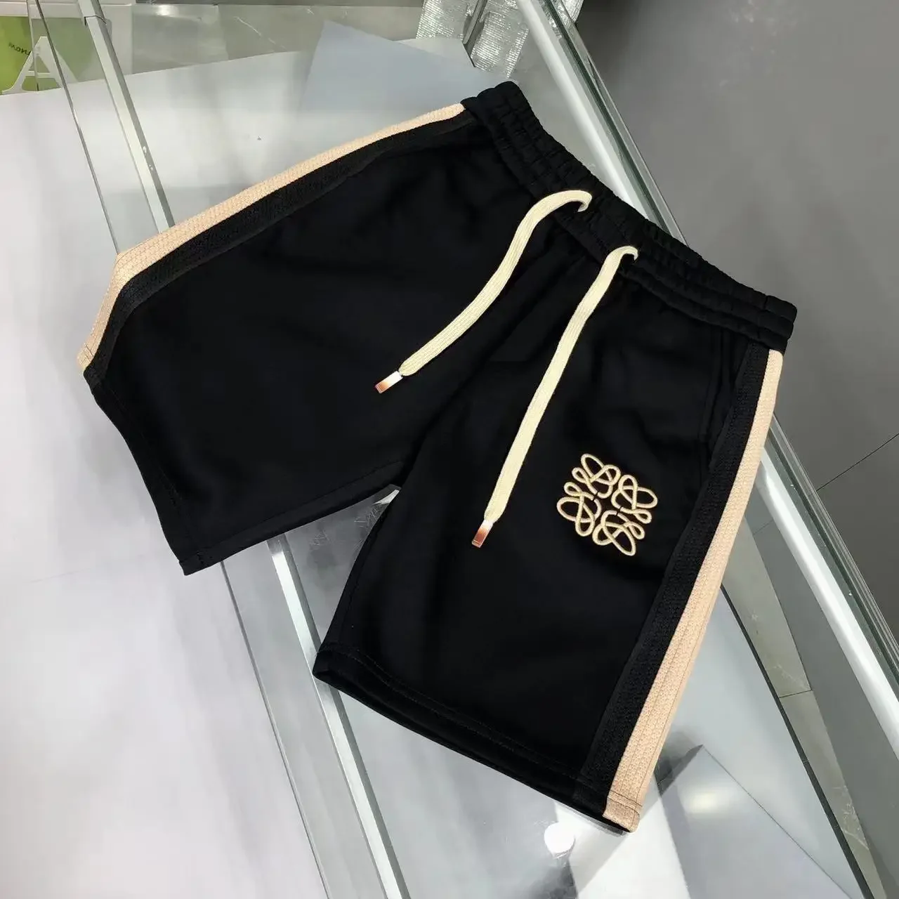 Summer new splicing webbing fashion embroidery simple sports casual shorts loose European beach five-point shorts