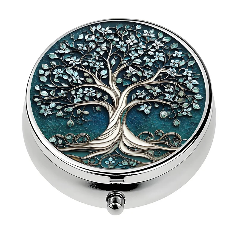 1 portable metal pill box, designed with a tree of life motif, featuring three compartments for easy organization of vitamins. Very suitable for travel and vitamin storage