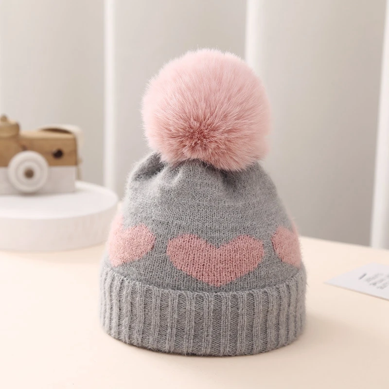 BeQeuewll Baby Girl Winter Hat Cute Heart Pattern Plush Pom Knit Beanie Warm Hospital Cap for Infant Cold Weather Accessories