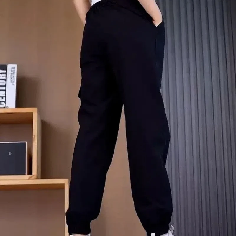 Modna odzież damska w stylu vintage Jednokolorowe elastyczne kieszenie Wiosenne jesienne spodnie Bloomers Cargo Przycięte spodnie z wysokim stanem