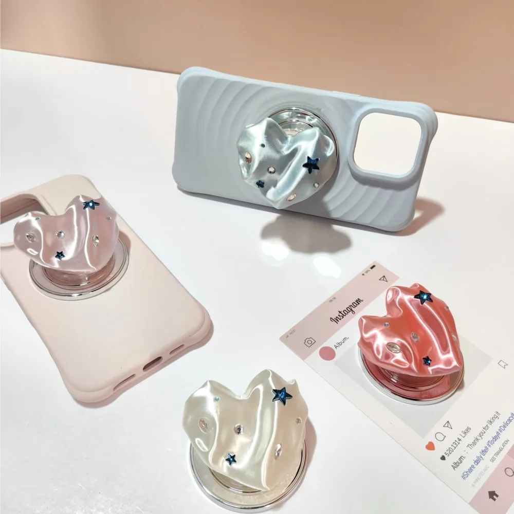 Support magnétique 3D en soie avec airbag, diamant électroplaqué en forme de cœur, offrant 6 options de support différentes, style luxe délicat
