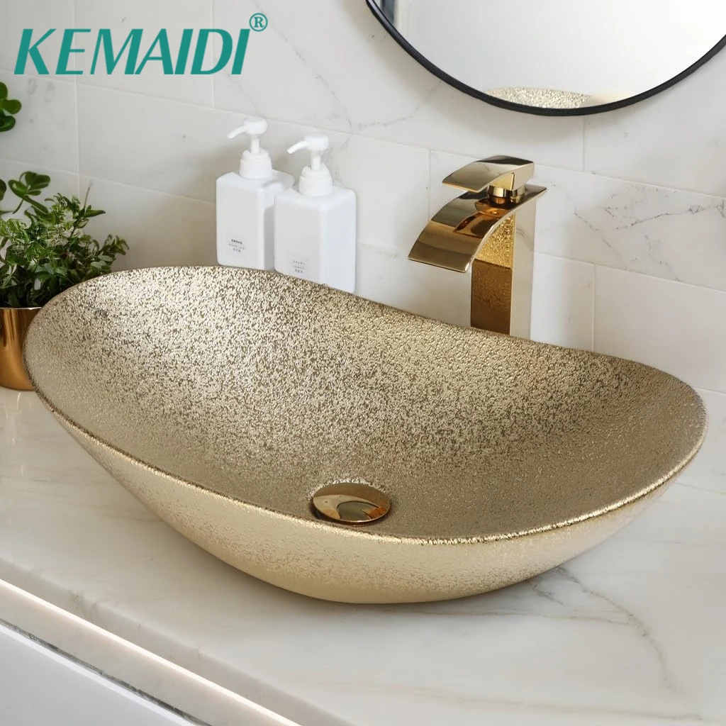 

KEMAIDI Matte Gold Bathroom Vessel Sink Combos Faucet And Drain Set 24x14 Inch Oval Ceramic Basin Bowl Above Counter Bowl Sinks
