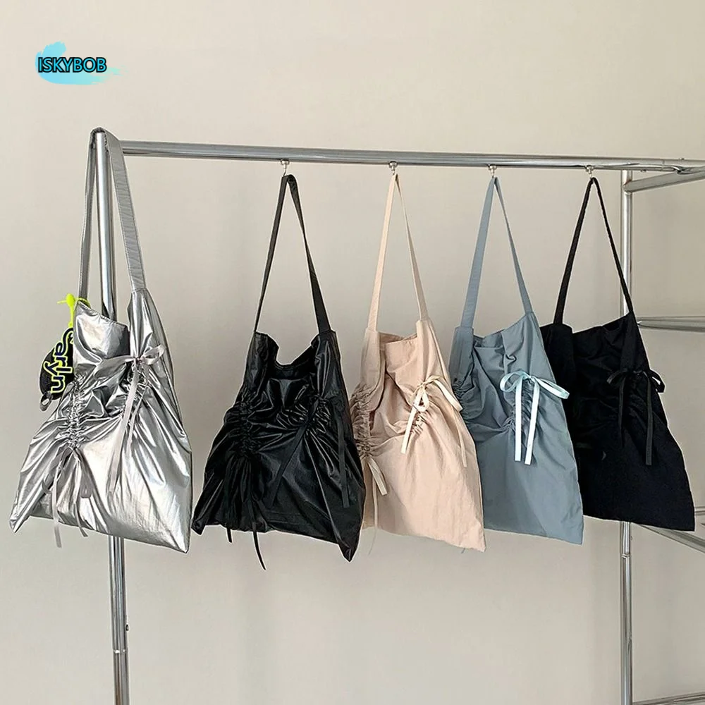 

Сумка-тоут в корейском стиле с бантом и завязками, складная, нейлоновая, с эффектом рюши, для повседневного использования, дизайнерская, серебристая, для путешествий